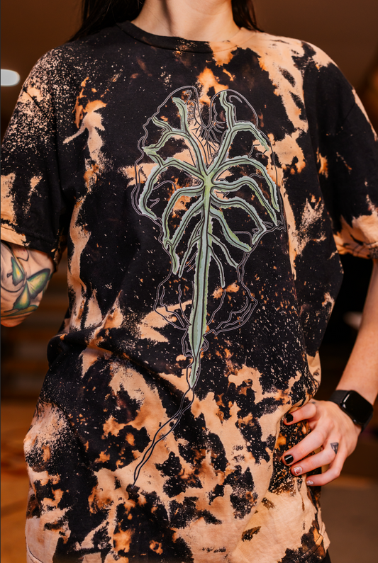 Alternative Black Bleached Alocasia  Venom Ghost Leaf T-shirt for plant lovers. Shirt Created by RattTrap Artistry