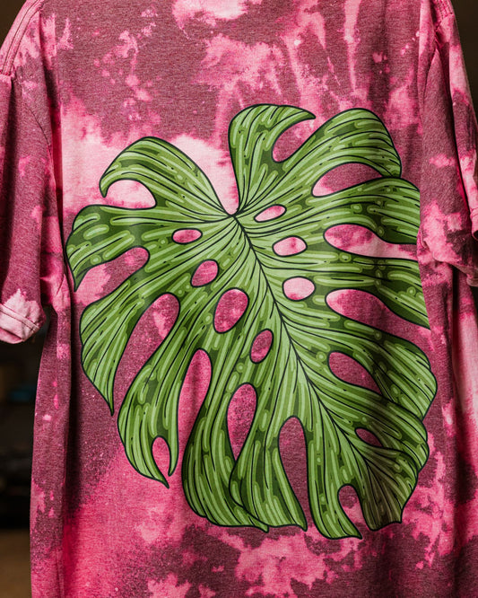 Bleached T-shirt with a monstera leaf design by RattTrap Artistry