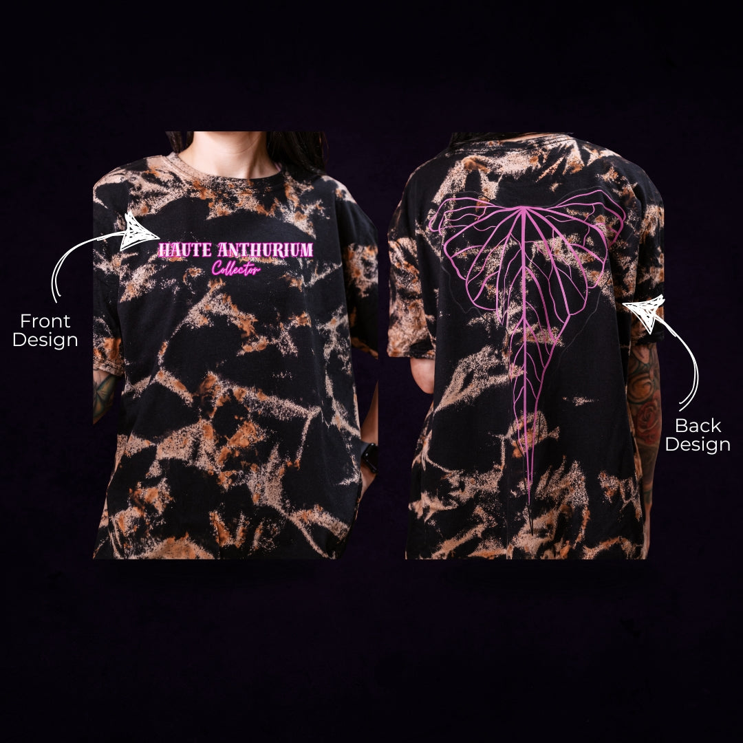 Black t-shirt with front and back designs on a black bleached T-shirt featuring a plant leaf. Created by RattTrap Artistry
