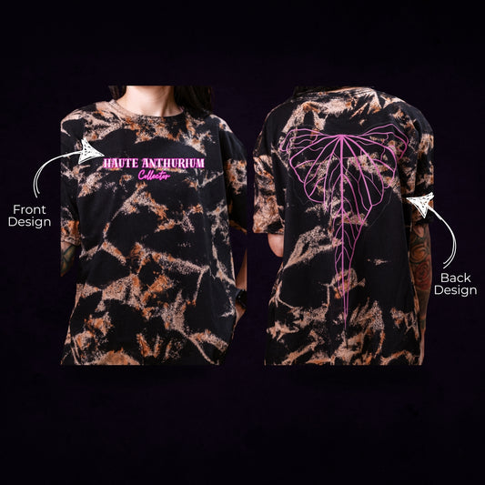 Black t-shirt with front and back designs on a black bleached T-shirt featuring a plant leaf. Created by RattTrap Artistry